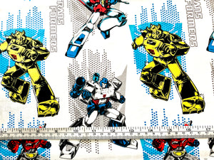 Transformers Logos - White Fabric - 1/2 Meter - Cotton Fabric