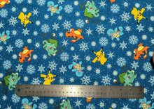 Load image into Gallery viewer, Holiday Pokemon Blue - Robert Kaufman - 1/2 Meter - Cotton Fabric
