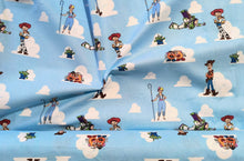 Load image into Gallery viewer, Toy Story Friends Sketch - Light Blue Fabric - 1/2 Meter - Cotton Fabric
